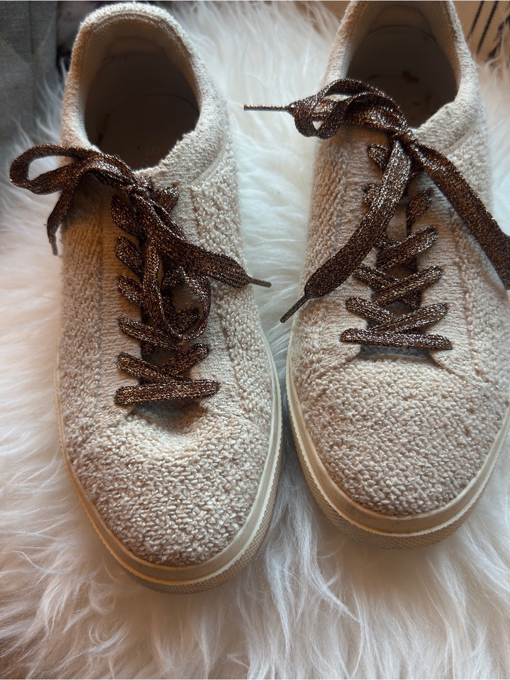 Rothy's Cream Knit Sneakers with Shimmery Bronze Laces